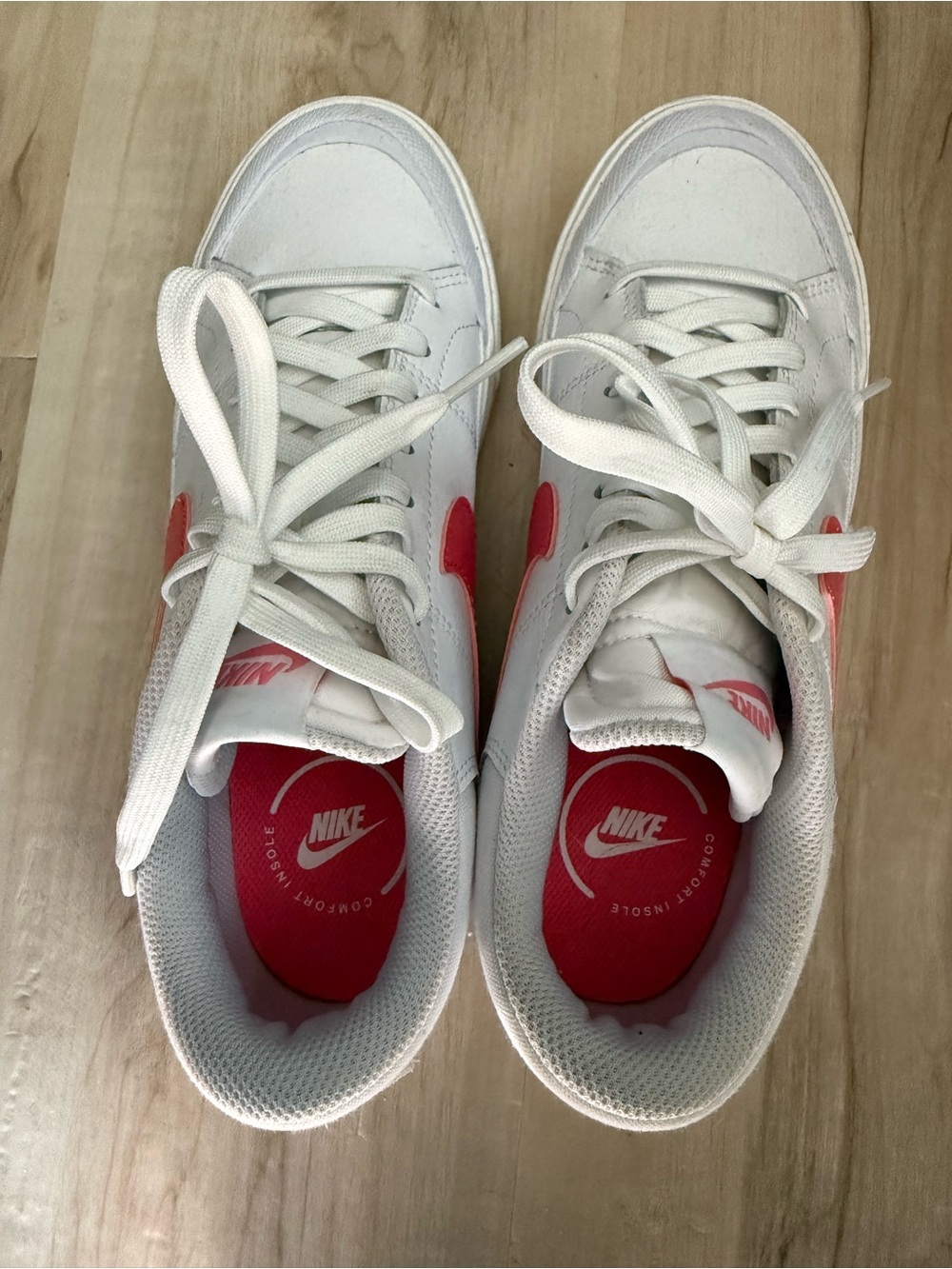 Nike Women’s White Sneakers with Pink Swoosh
